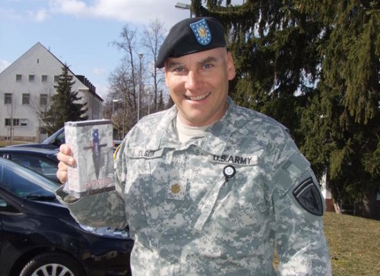 Soldier with Riley St. James book
