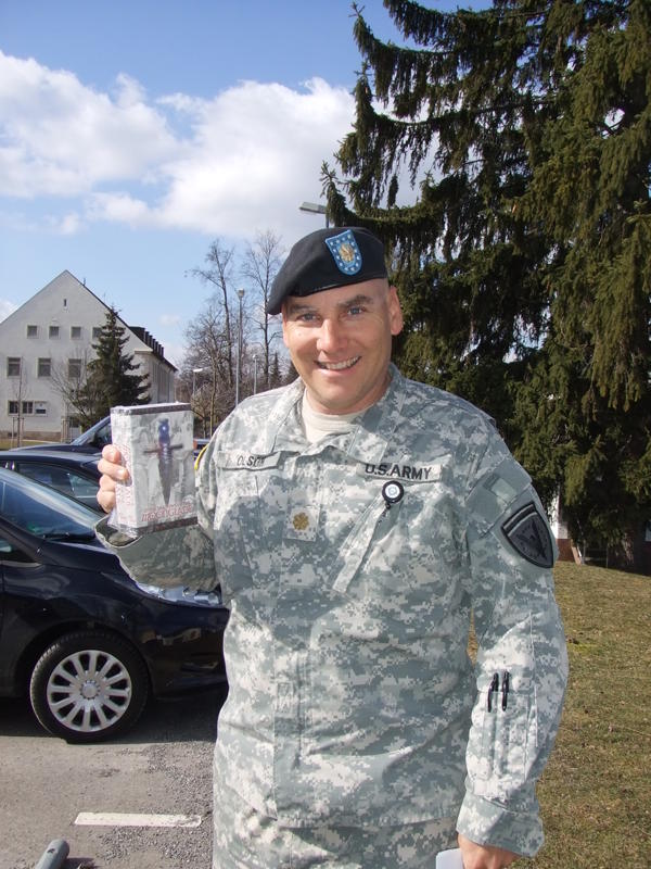 Soldier with Riley St. James book